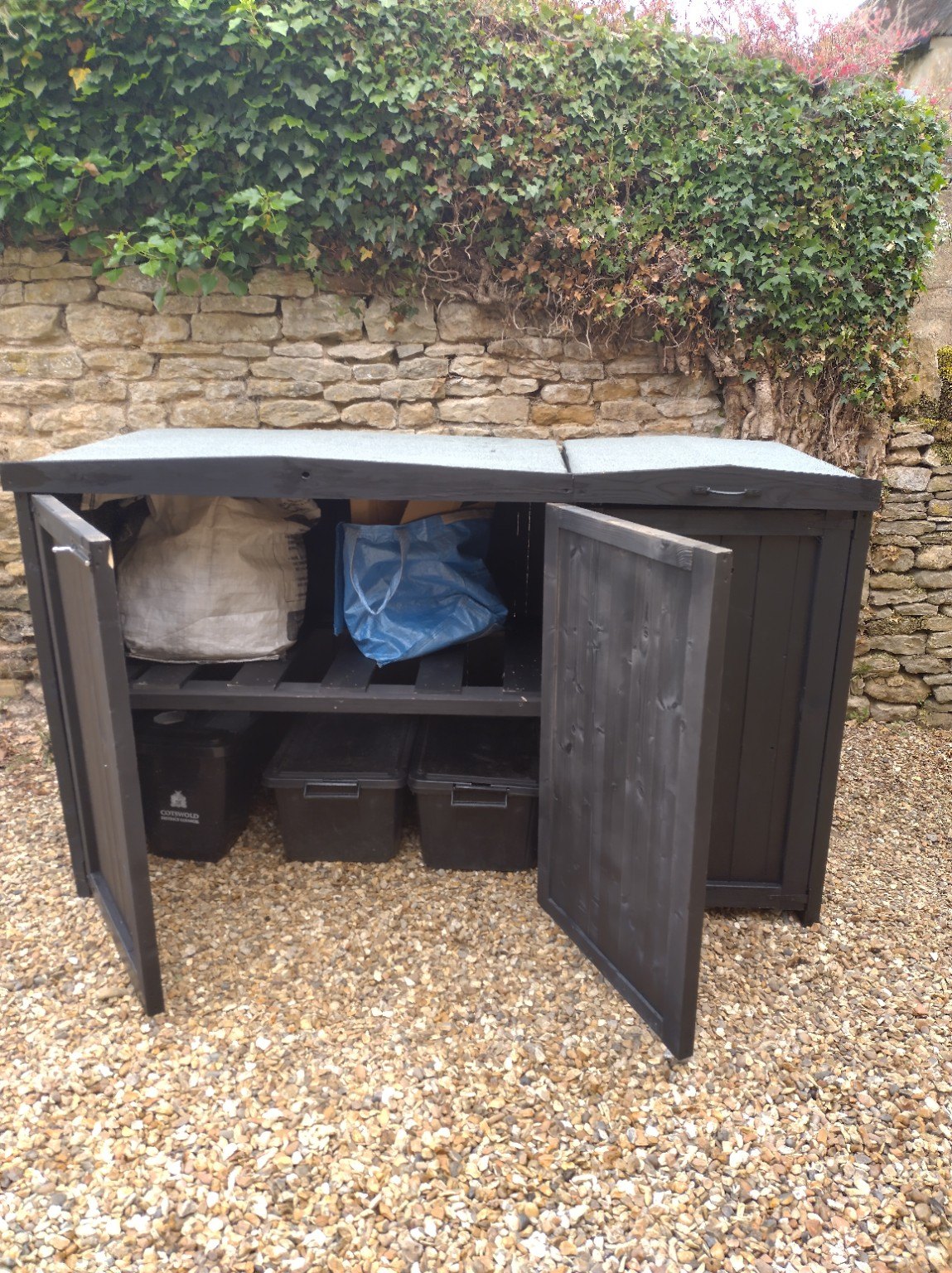 Recycling shelves behind double doors